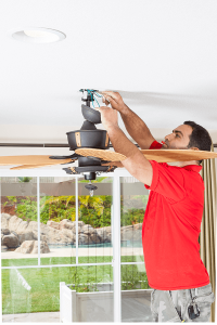 Electrician Repairing Ceiling Fan